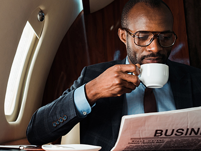 Creating Wealth man on business jet